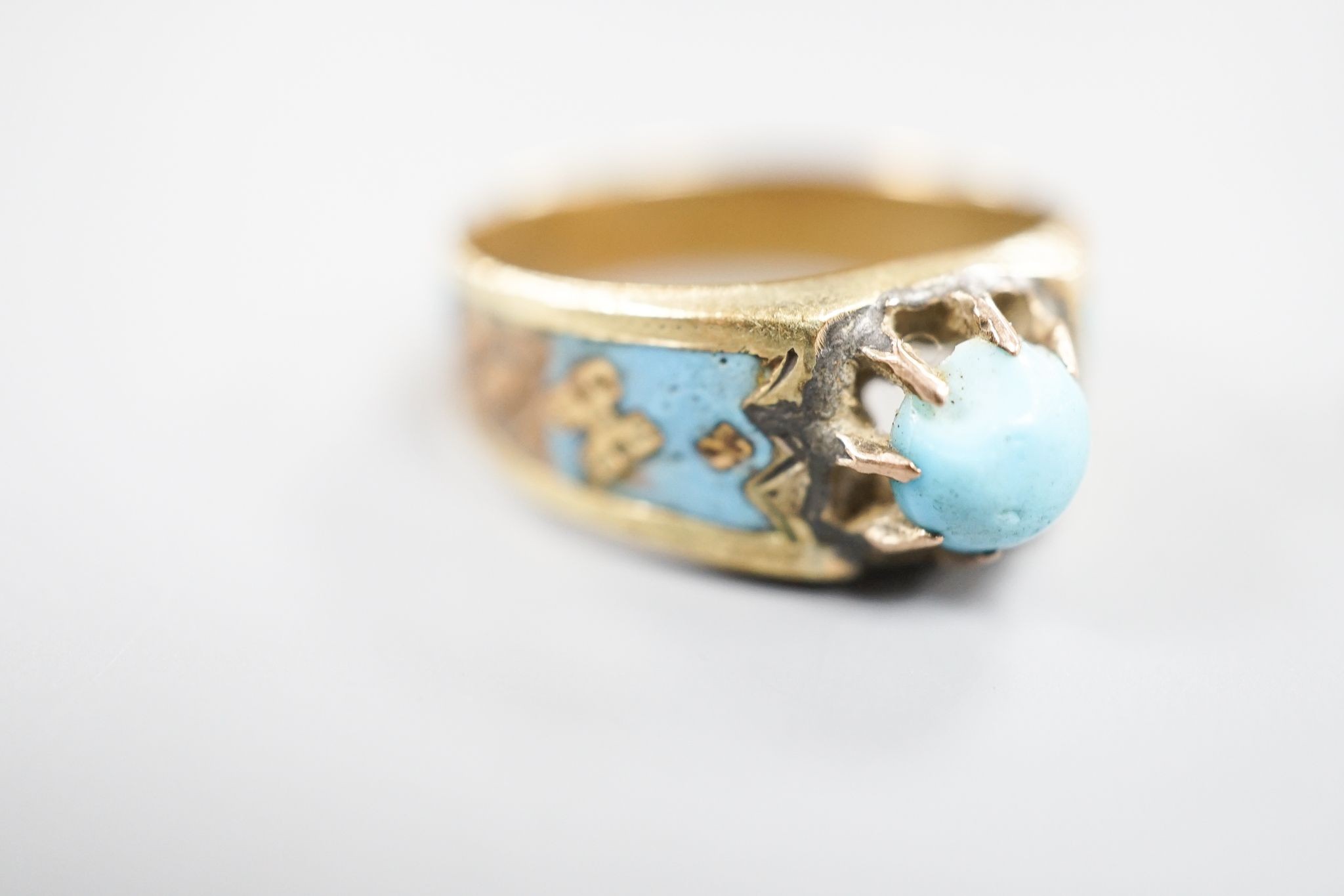 An antique yellow metal, turquoise and enamel set ring, size U/V, and a Victorian yellow metal and turquoise pendant, gross weight 6.3 grams.